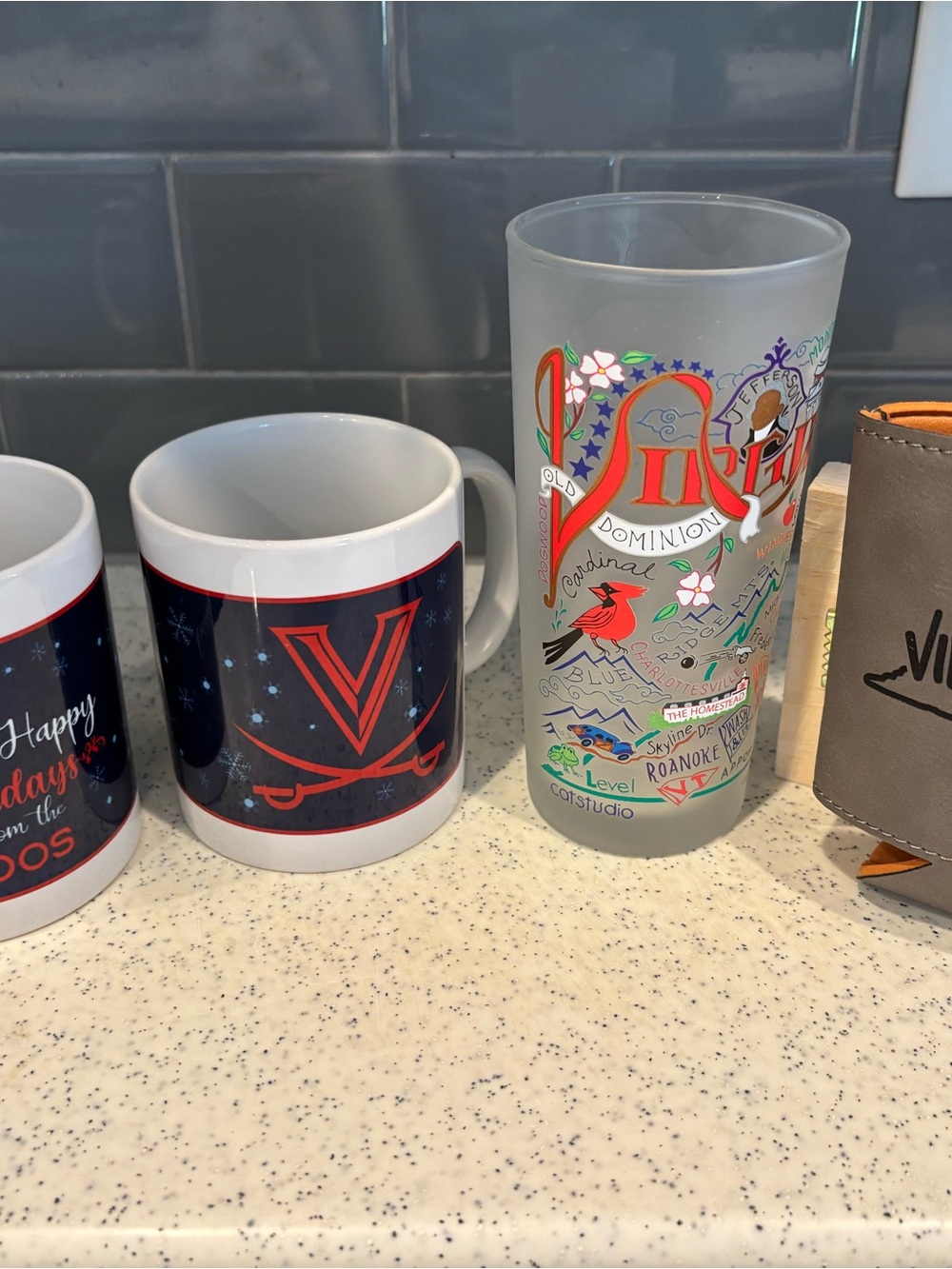 Virginia Commonwealth and University of Virginia souvenir mugs and cupware